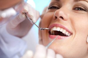 how to deal with teeth whitening sensitivity